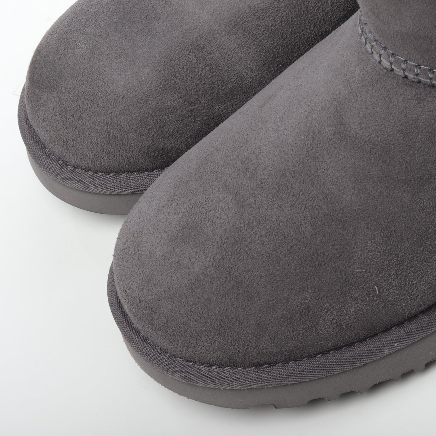 UGG Mini Bailey Button Grey Unisex